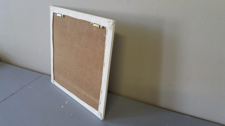 Stretched canvas on board